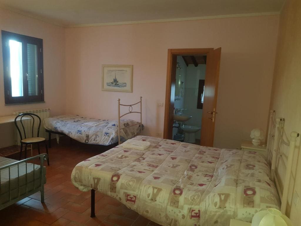 Quadruple Room with Private Bathroom room - Image 1