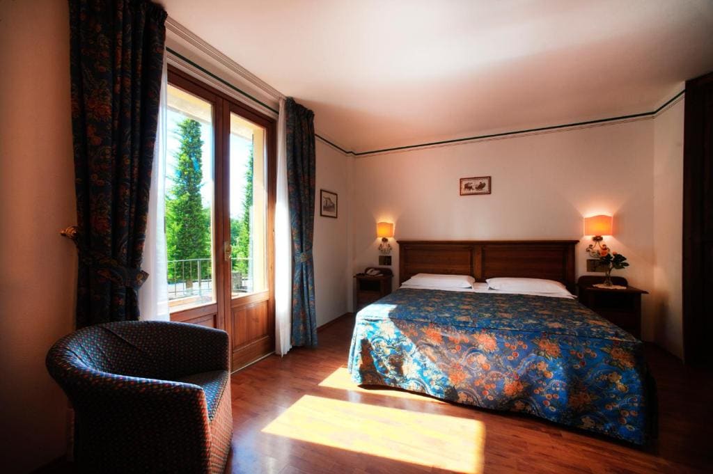 Quadruple Room with Private Bathroom room - Image 1