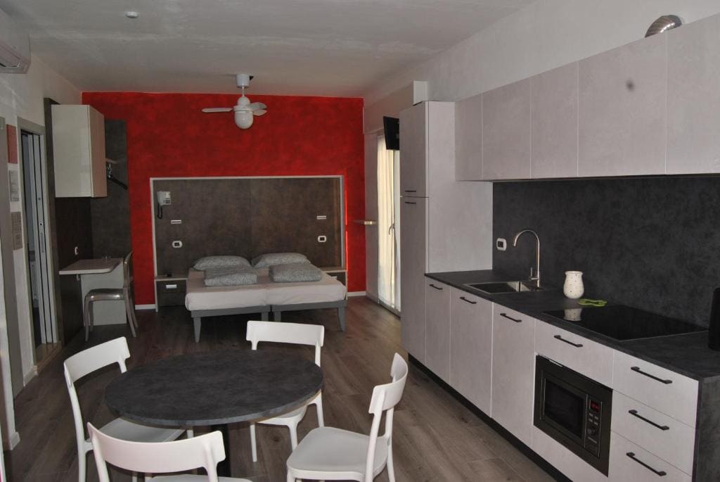 Junior Suite with Balcony and Lake View and Kitchenette room - Image 3