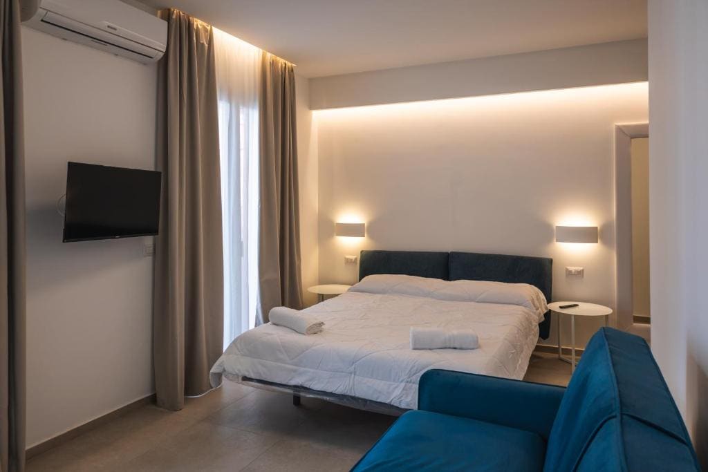 Quadruple Room with Private Bathroom room - Image 2