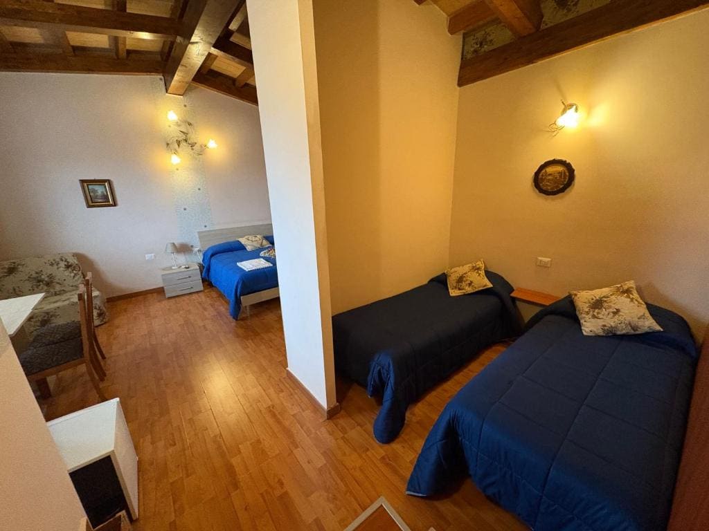 Quadruple Room with Private Bathroom room - Image 2