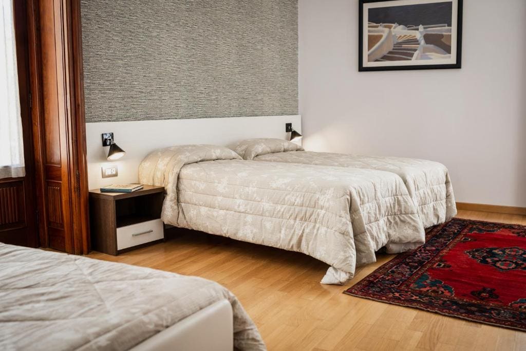 Deluxe Queen Room with Two Queen Beds room - Image 3