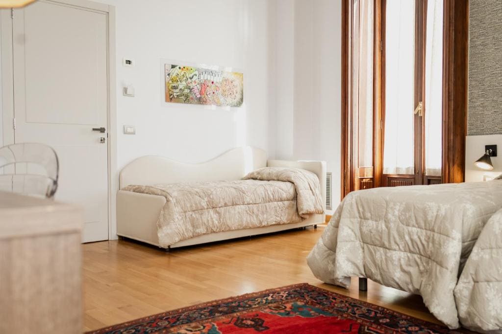 Deluxe Queen Room with Two Queen Beds room - Image 1