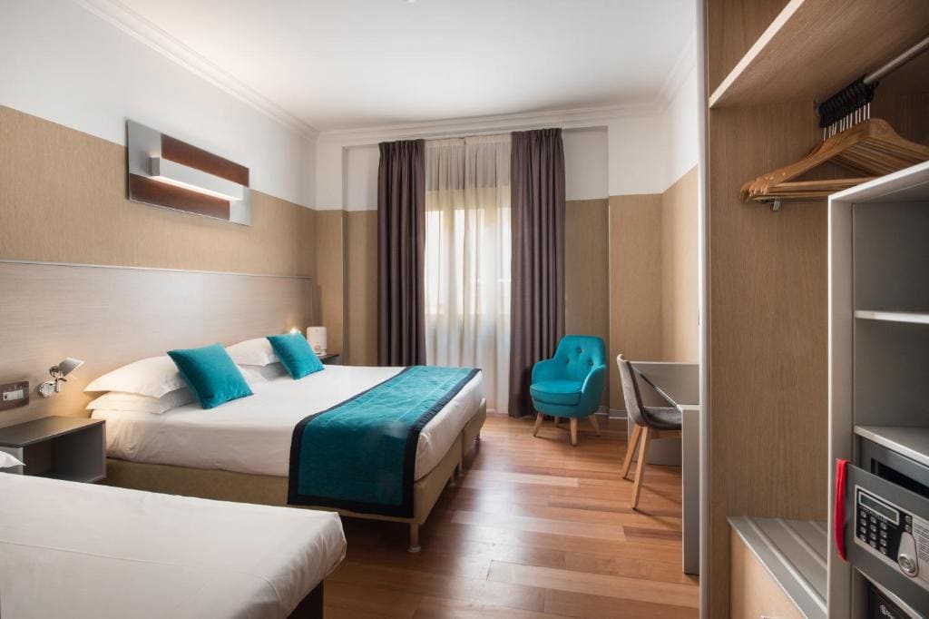 Deluxe King Room with Sofa Bed room - Image 3