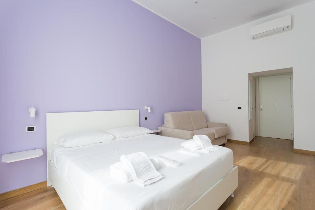 Quadruple Room with Private Bathroom room - Image 2