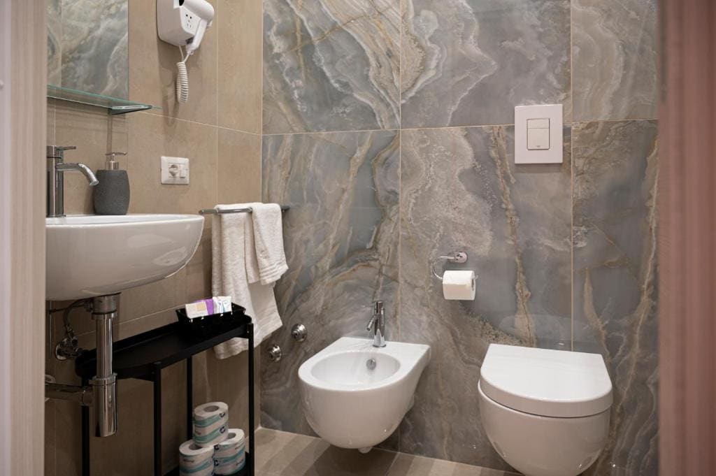 Quadruple Room with Private Bathroom room - Image 1