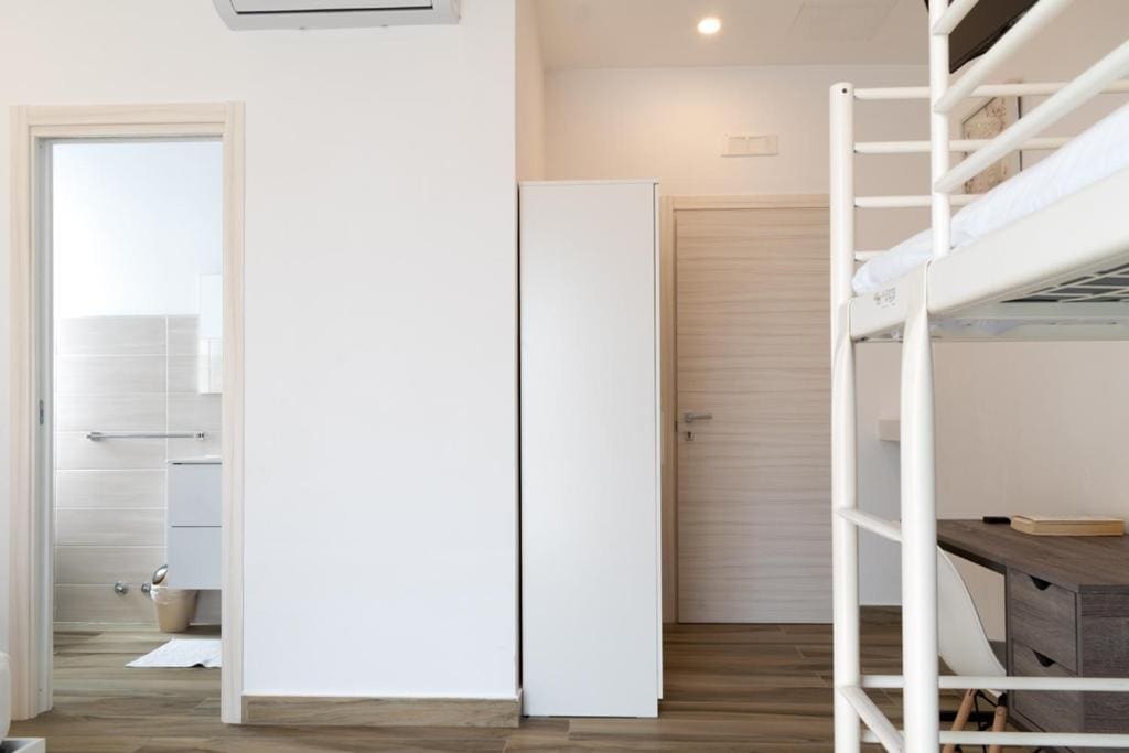 Quadruple Room with Private Bathroom room - Image 1