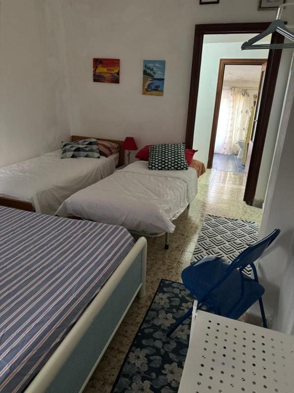 Economy Quadruple Room with Shared Bathroom room - Image 2