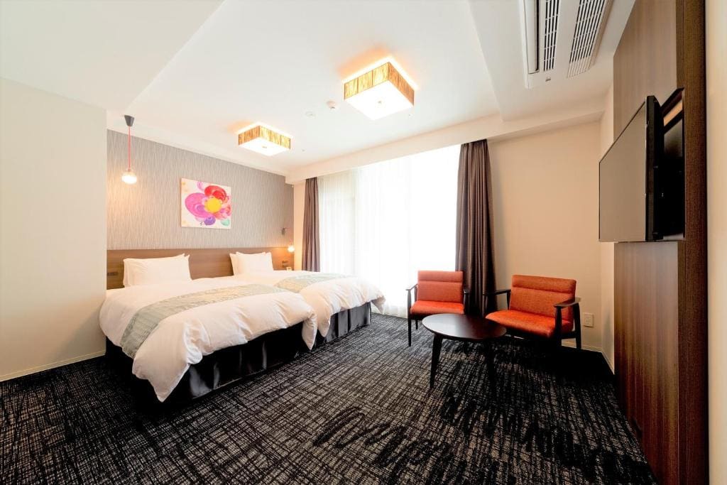 Deluxe Twin Room with Extra Bed room - Image 1