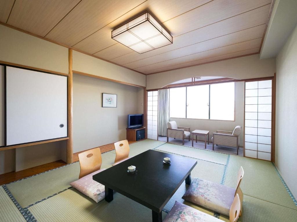 Classic Japanese Style Room with Four Futon Beds and Partial Ocean View room - Image 1
