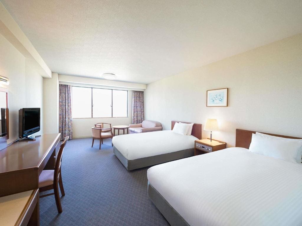 Classic Room with Two Single Beds/One Sofa Bed/One Extra Bed room - Image 1
