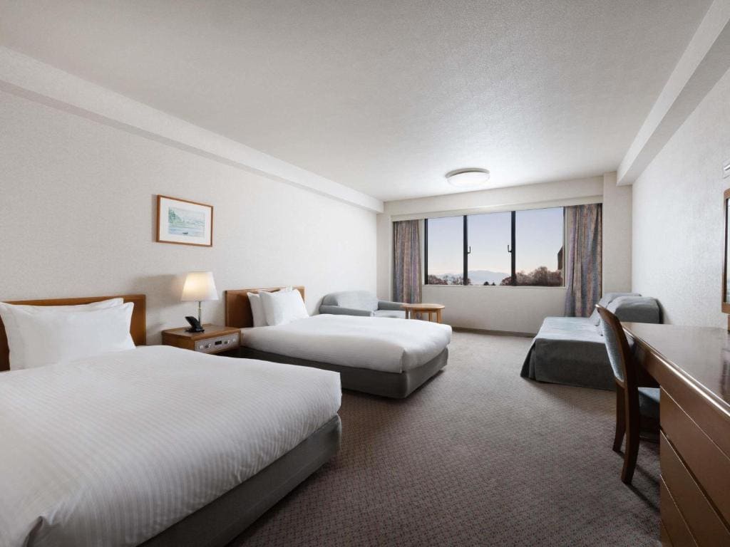 Classic Room with Two Single Beds/One Sofa Bed/One Extra Bed room - Image 2