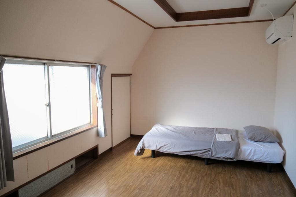Single Room with Shared Shower and Toilet room - Image 1