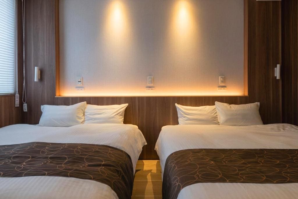 Standard Queen Room with Two Queen Beds room - Image 1
