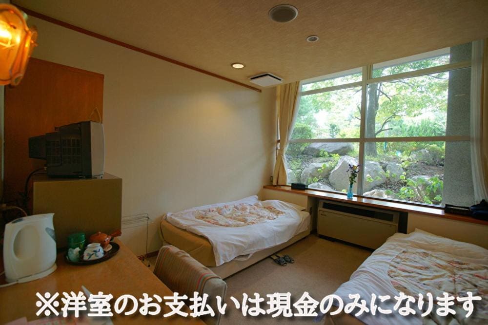 Quadruple Room with Shared Bathroom room - Image 1