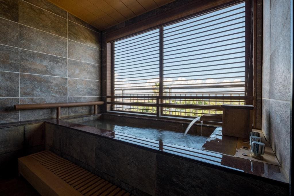 Deluxe Japanese-Style Room with Semi Open-Air Bath room - Image 1