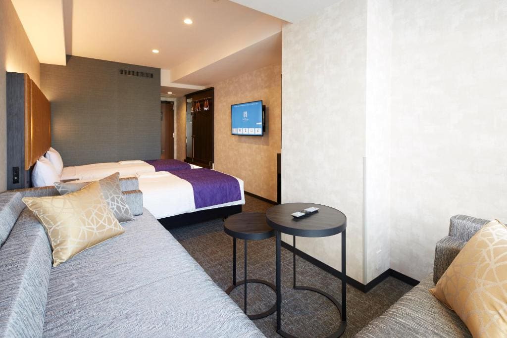 Deluxe Twin Room with Sofa bed and Extra bed room - Image 3
