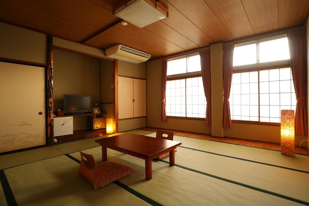 Economy Quadruple Room with Shared Bathroom room - Image 1
