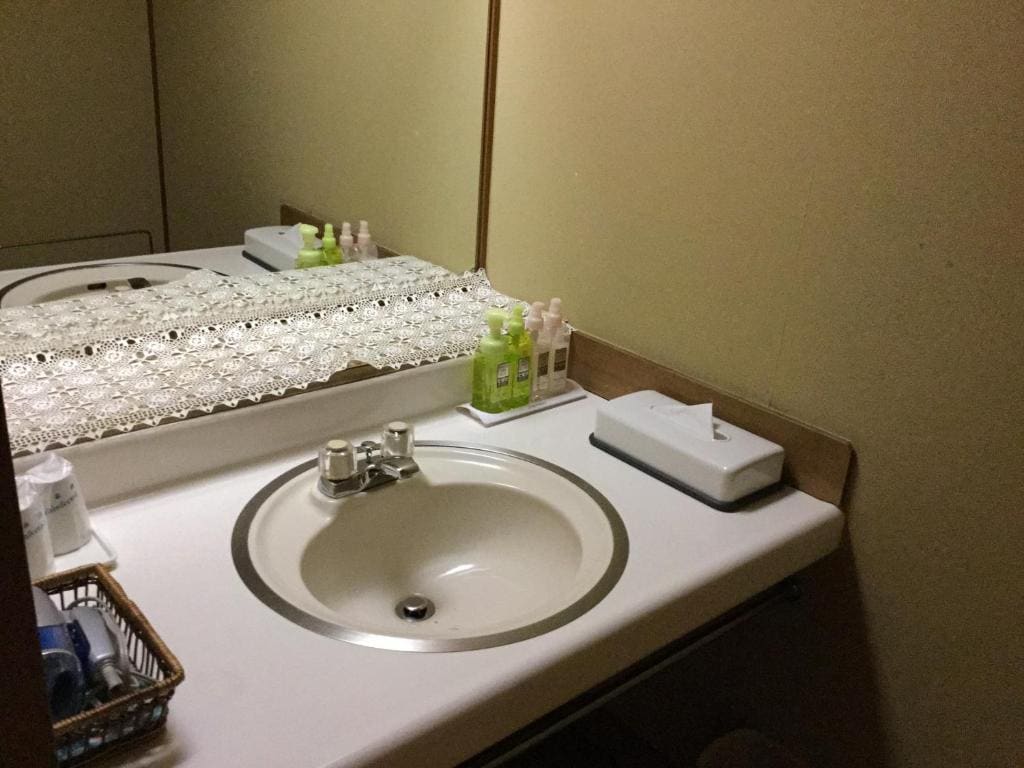 Japanese-Style Family Room with Shared Bathroom room - Image 1