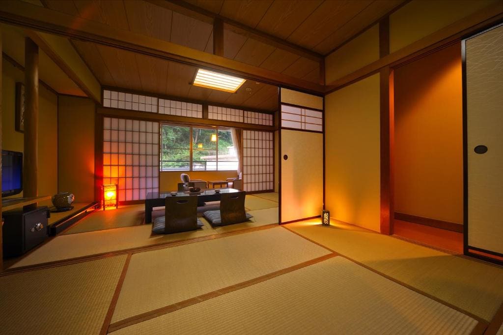 Japanese-Style Family Room with Shared Bathroom room - Image 2