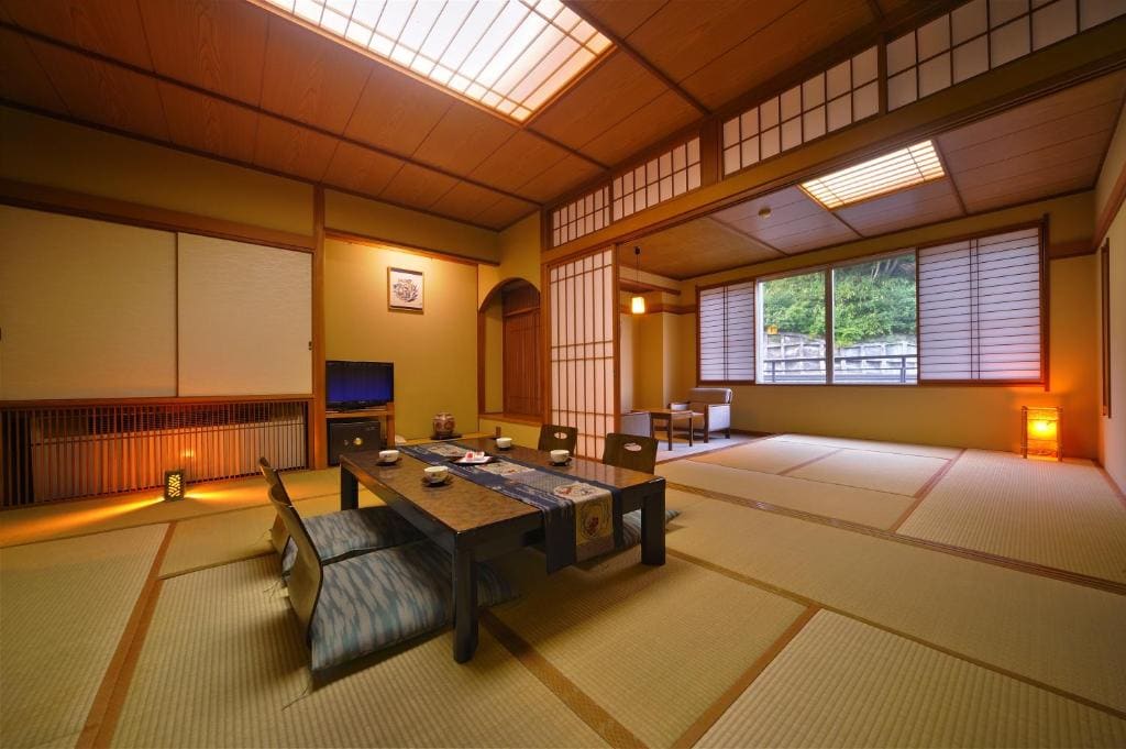 Japanese-Style Family Room with Shared Bathroom room - Image 3