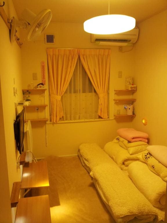 Japanese-Style Family Room with Shared Bathroom room - Image 1
