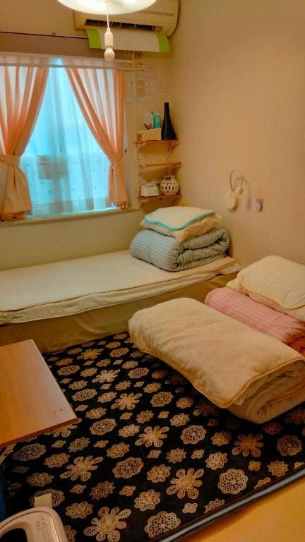 Japanese-Style Family Room with Shared Bathroom room - Image 2