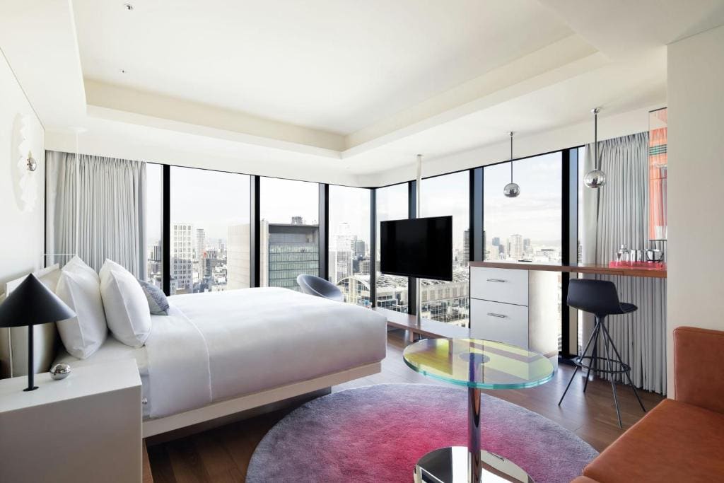 Guest Room with 1 King Bed, City view, Corner room room - Image 3