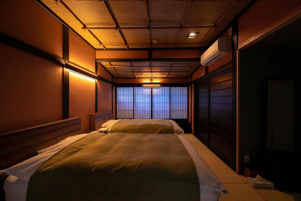 Deluxe Room with Bed Room with large Open-Air Bath and Indoor Bath room - Image 1