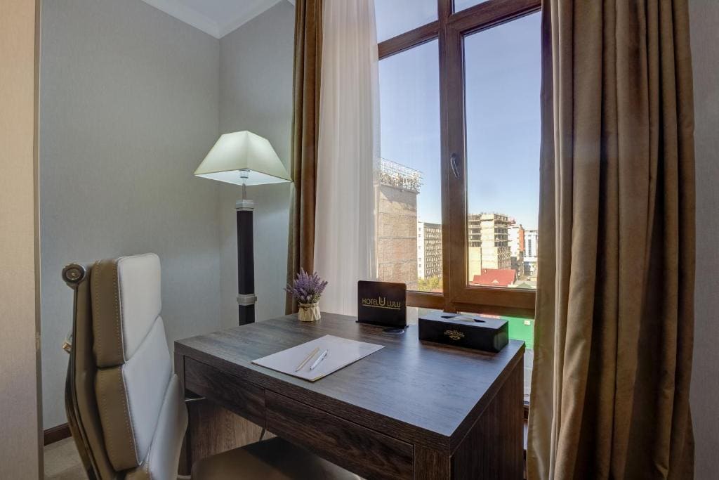 Deluxe Single Room with Balcony room - Image 2