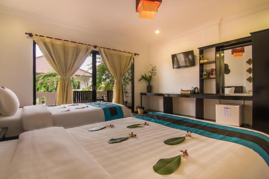 Deluxe Triple Room with Pool View room - Image 3