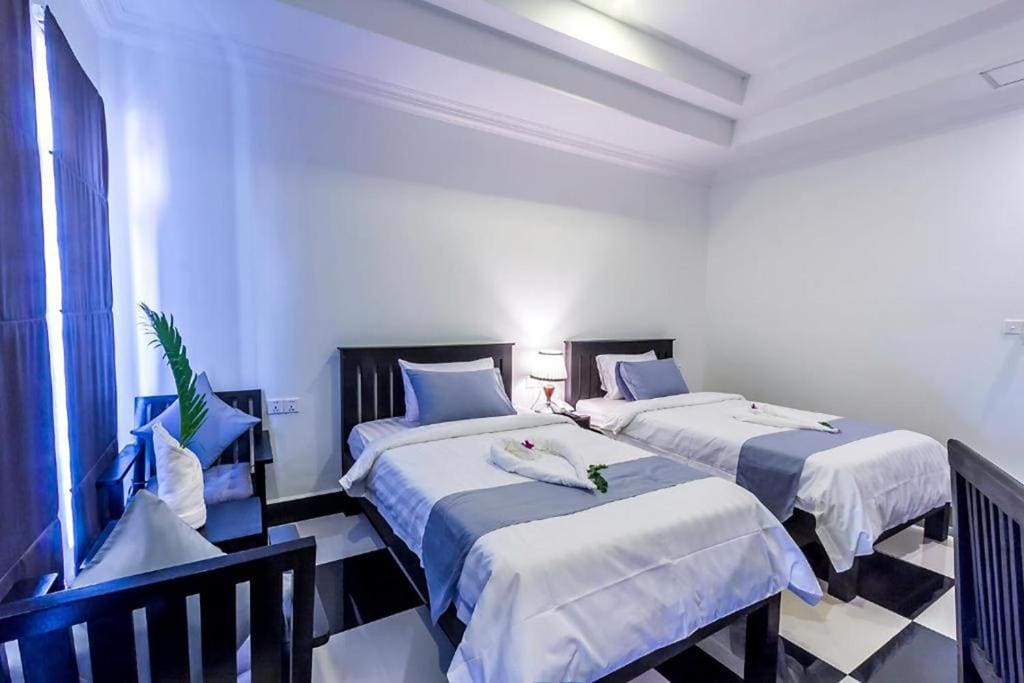 Deluxe Twin Room with Pool View room - Image 1