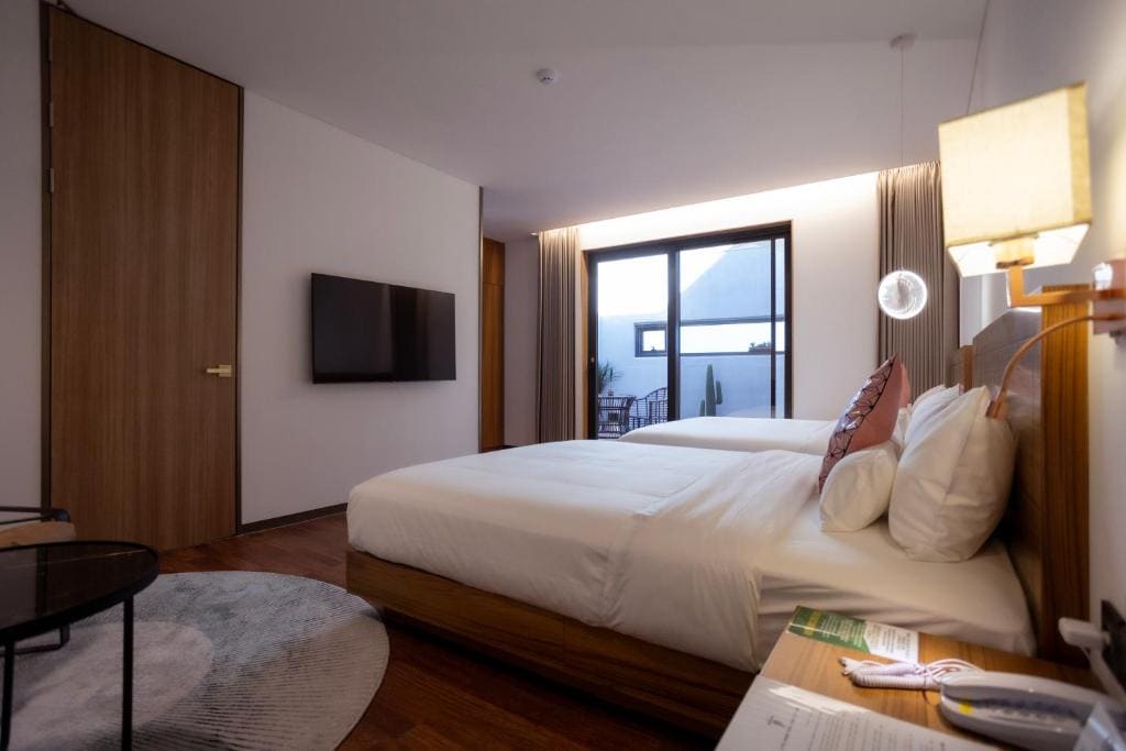Deluxe Quadruple Room room - Image 2