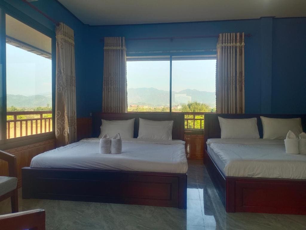 Deluxe Quadruple Room room - Image 2