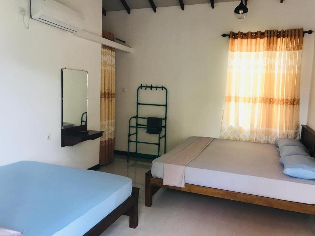 Deluxe Double Room (2 Adults + 1 Child) room - Image 2
