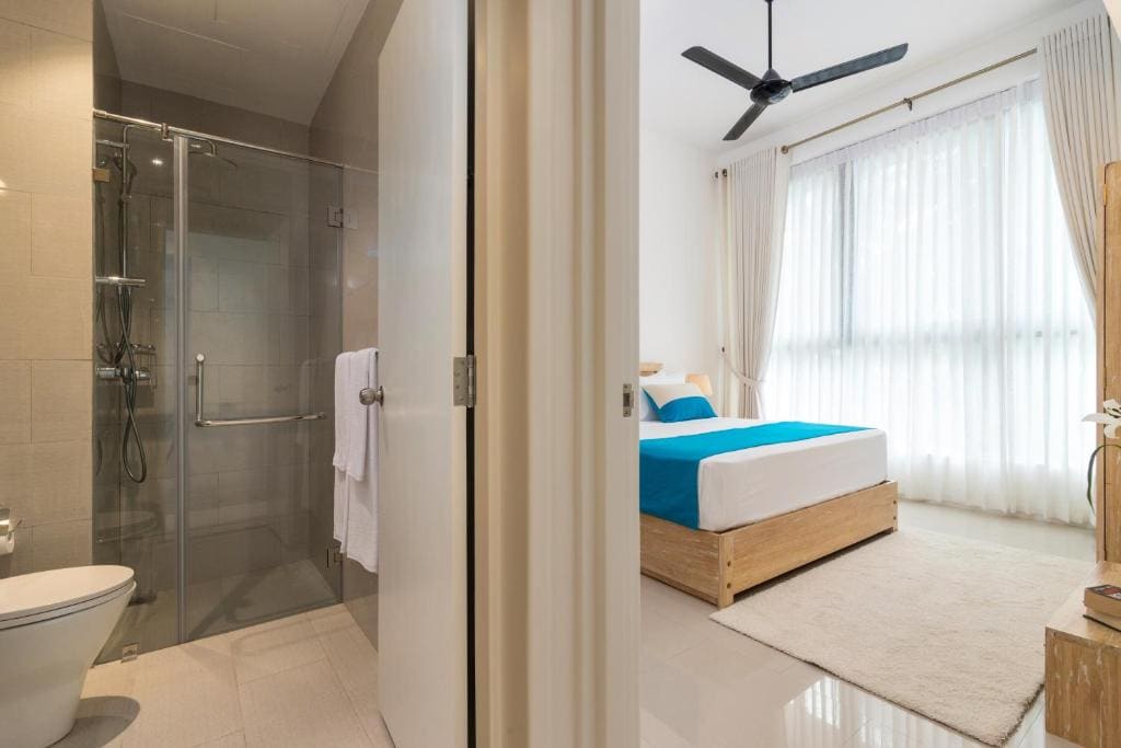 Three-Bedroom Apartment with Partial Ocean View room - Image 2