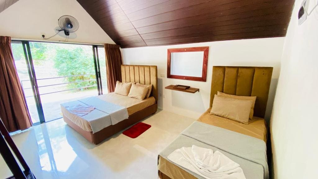 Deluxe Single Room with Balcony room - Image 2
