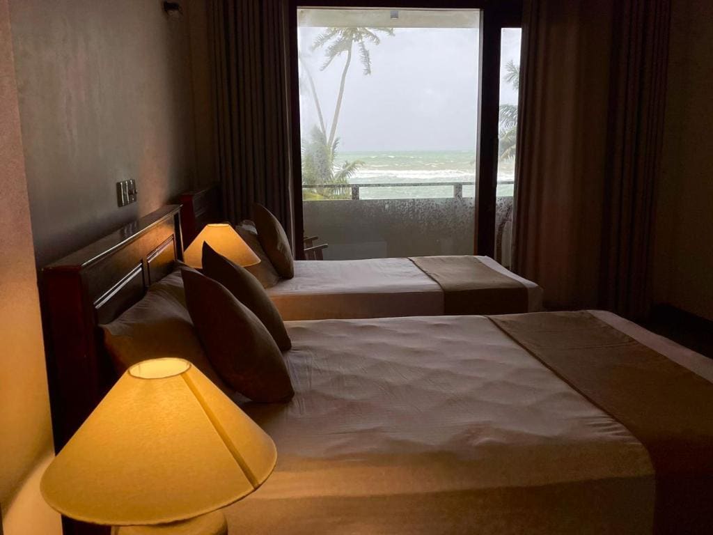 Deluxe Triple Room with Sea View room - Image 3