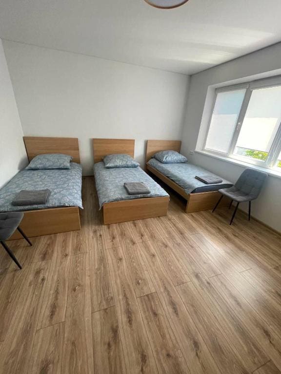 Basic Triple Room with Shared Bathroom room - Image 2