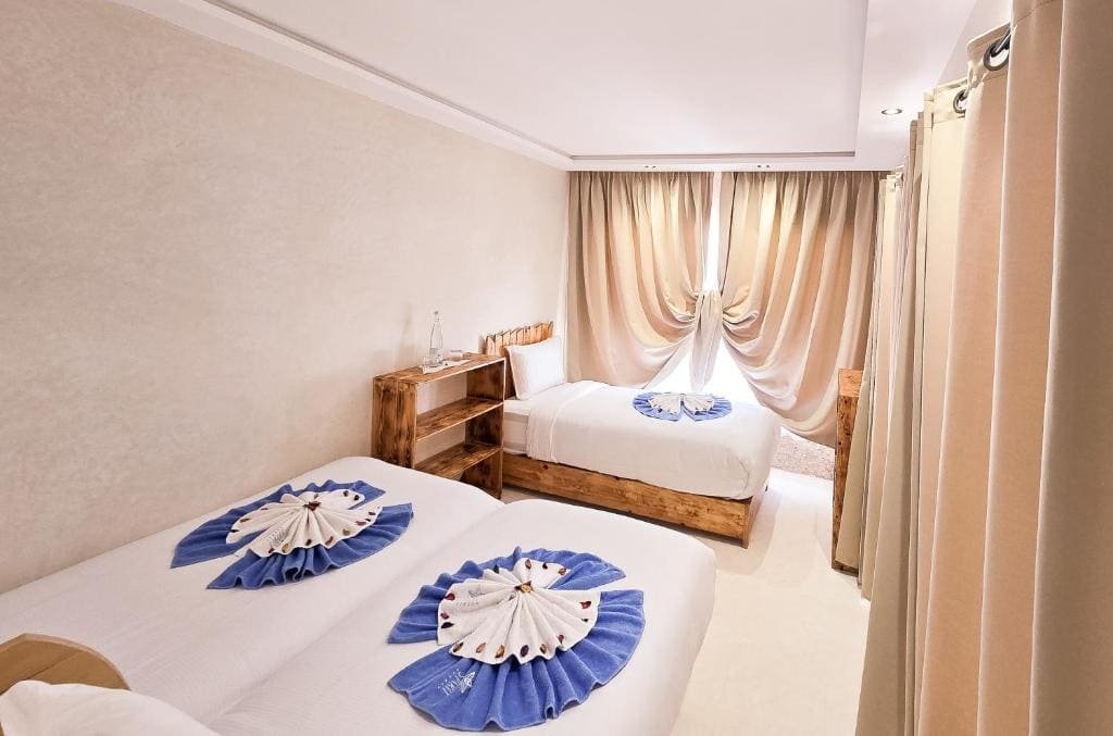 Superior Triple Room with Sea View room - Image 3