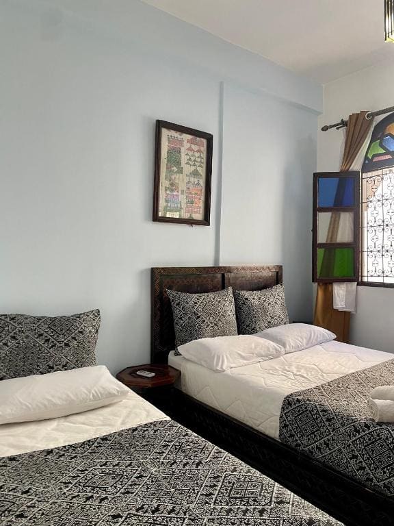 Deluxe Double Room (2 Adults + 1 Child) room - Image 3