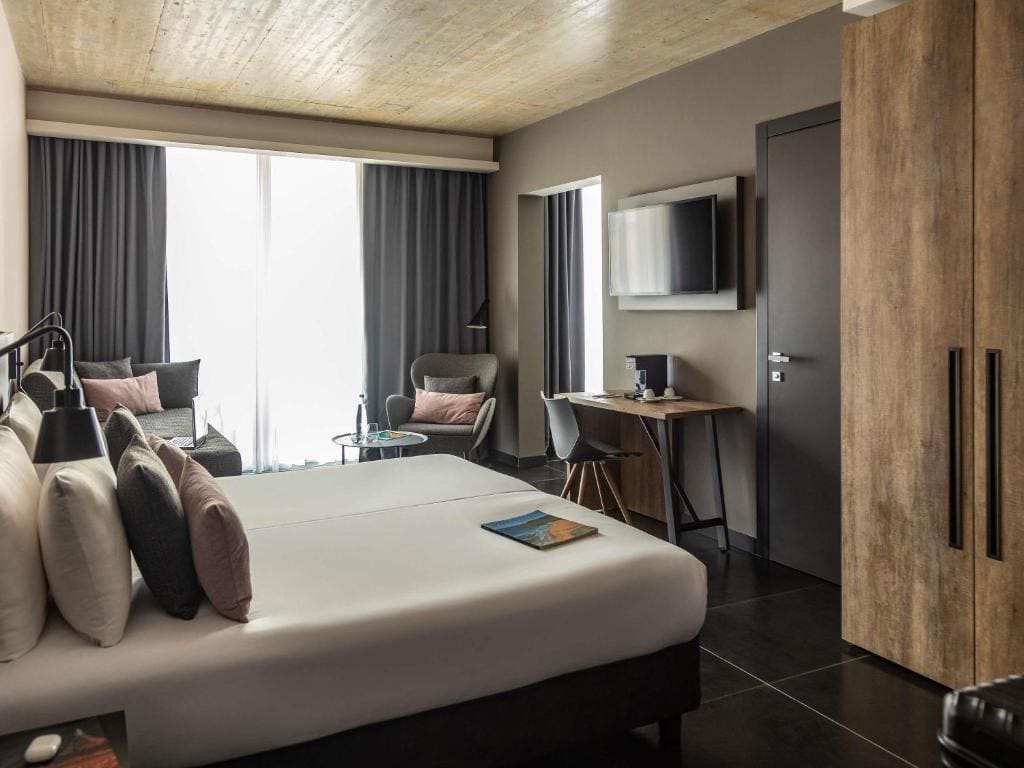Junior Suite with One Double and Two Single Beds room - Image 2