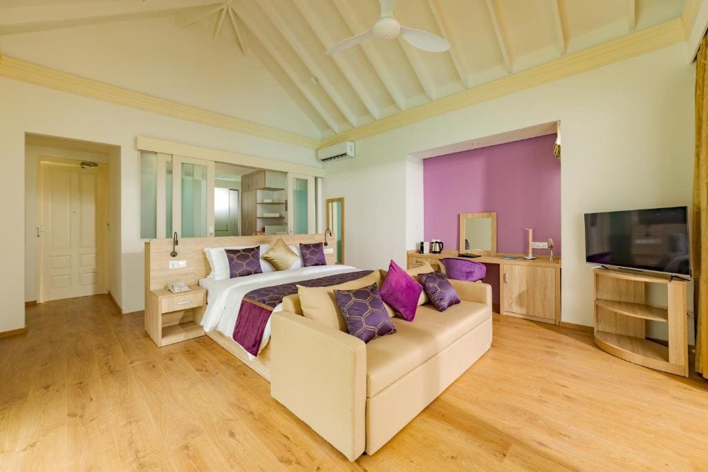 Lagoon Villa Pool + Slide - Free shared seaplane for 2 guests, minimum 7-night stay room - Image 1