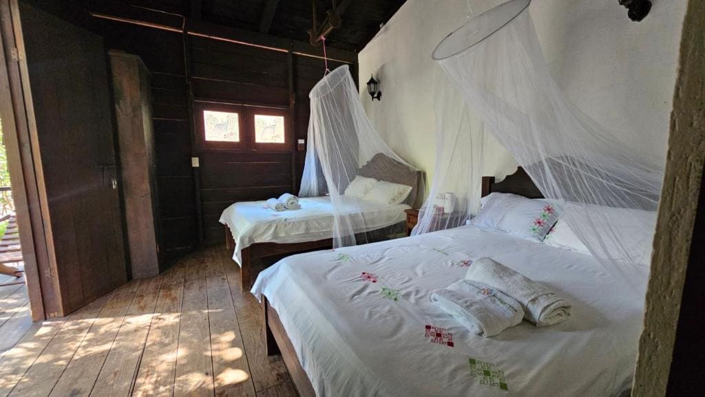 Quadruple Room with Private Bathroom room - Image 1
