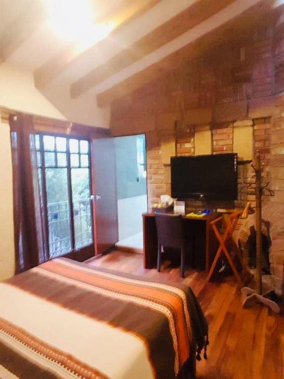 Double Room with Balcony (3 Adults) room - Image 1