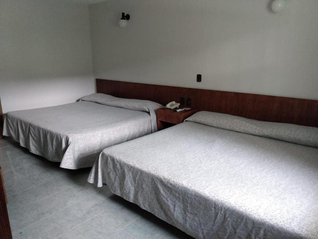 Queen Room with Two Queen Beds room - Image 2