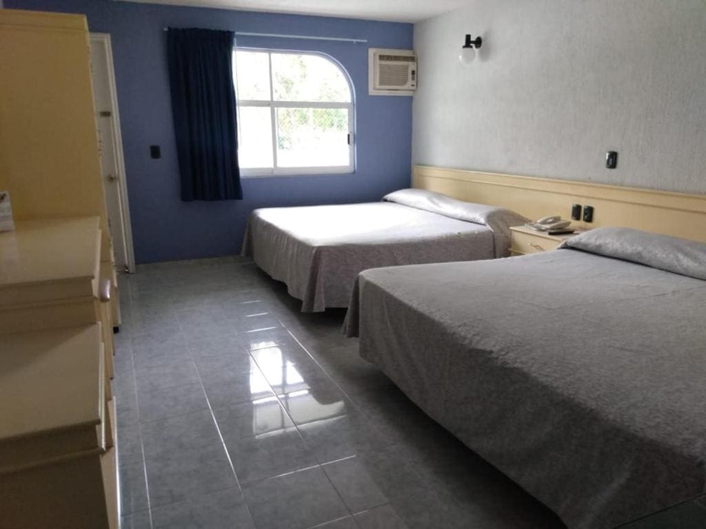 Queen Room with Two Queen Beds room - Image 3