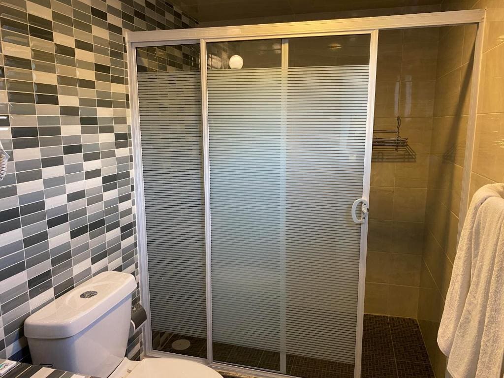 Deluxe Queen Room with Two Queen Beds room - Image 2