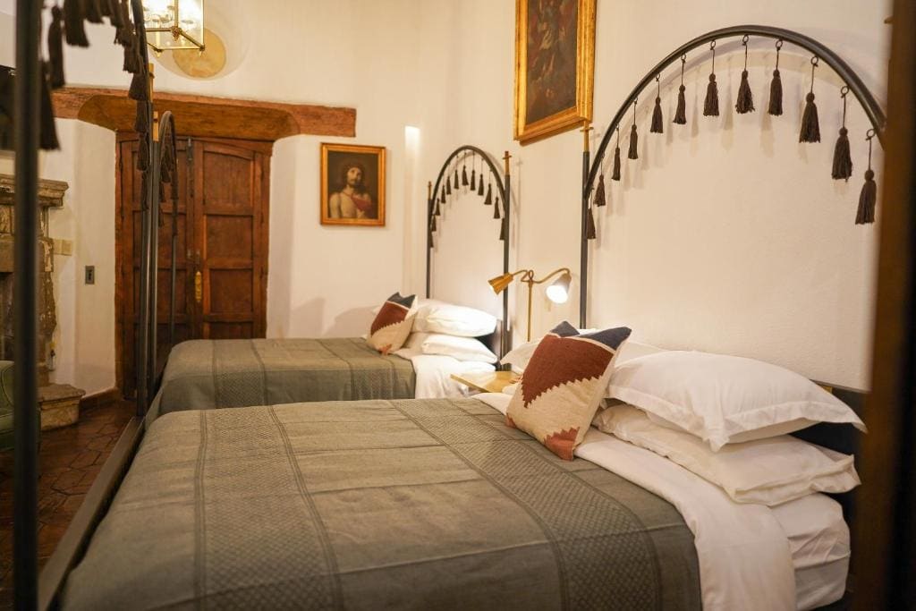 Deluxe Queen Room with Two Queen Beds room - Image 3