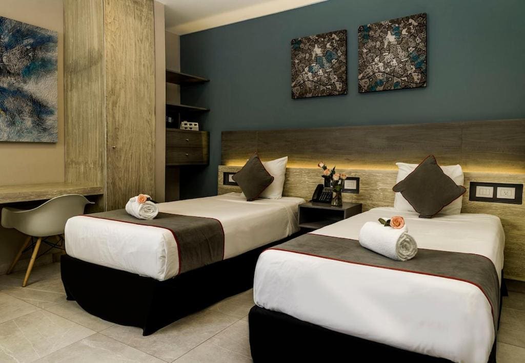 Deluxe Quadruple Room room - Image 1